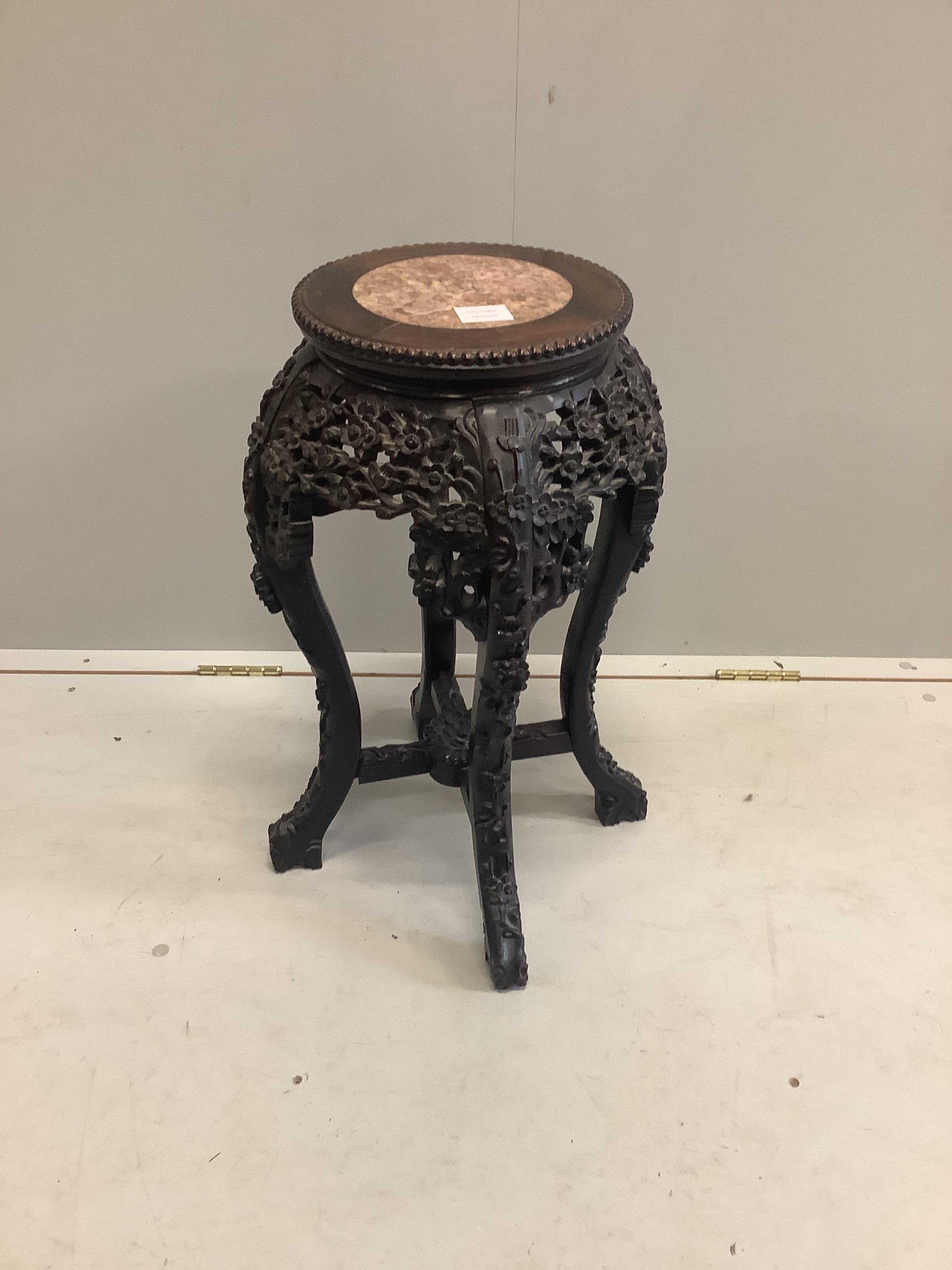 A Chinese circular marble top hongmu jardiniere stand, height 61cm